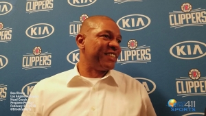 Doc Rivers talking with reporters at the Barclays Center in Brooklyn prior to a game with the Brooklyn Nets