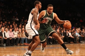 Sean Kilpatrick Nets shooting guard defending against Bucks forward Jabari Parker (12)