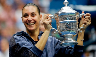 Italian Flavia Pennetta holds US OPEN 2015 trophy after defeating fellow Italian Roberta Vinci, 7-6, 6-2