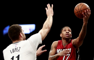 Brooklyn Nets center Brook Lopez defending Heat guard Rodney McGruder who is going up for a shot against the Nets at the Barclays Cent on February 10, 2017 . 