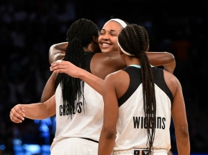 Liberty&#039;s Tina Charles congratulates Kiah Stokes with a hug