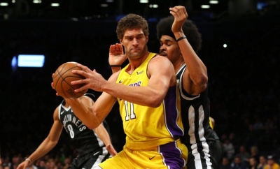 Jarrett Allen, Brooklyn Nets center (right), putting defensive moves on Brook Lopez in game at Barclays Center on February 2, 2018.