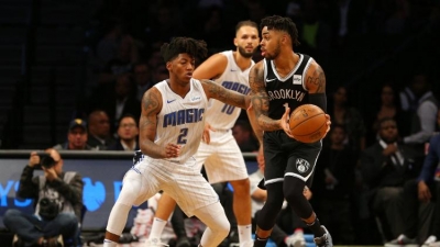 D&#039;Angelo Russell gets by Magic&#039;s Elfrid Payton in Nets home opener  