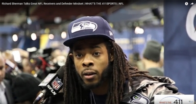 Richard Sherman Seattle Seahawks cornerback talking with the media at Super Bowl Media day 2014